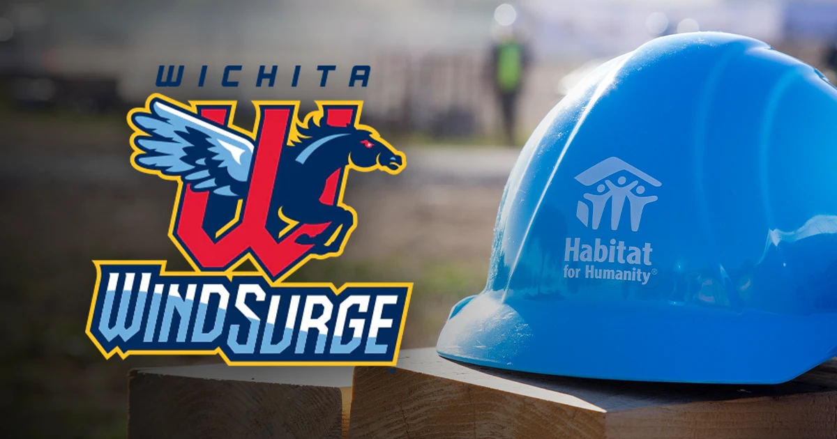 A blue construction hat placed on two wooden studs with the Wichita Wind Surge logo.
